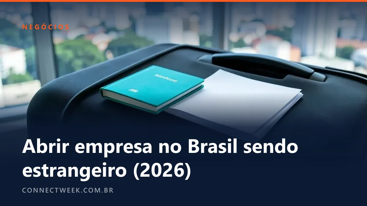 Dois passaportes e a alça de uma mala de mão ao lado de uma pasta de documentos em branco numa mesa de coworking
